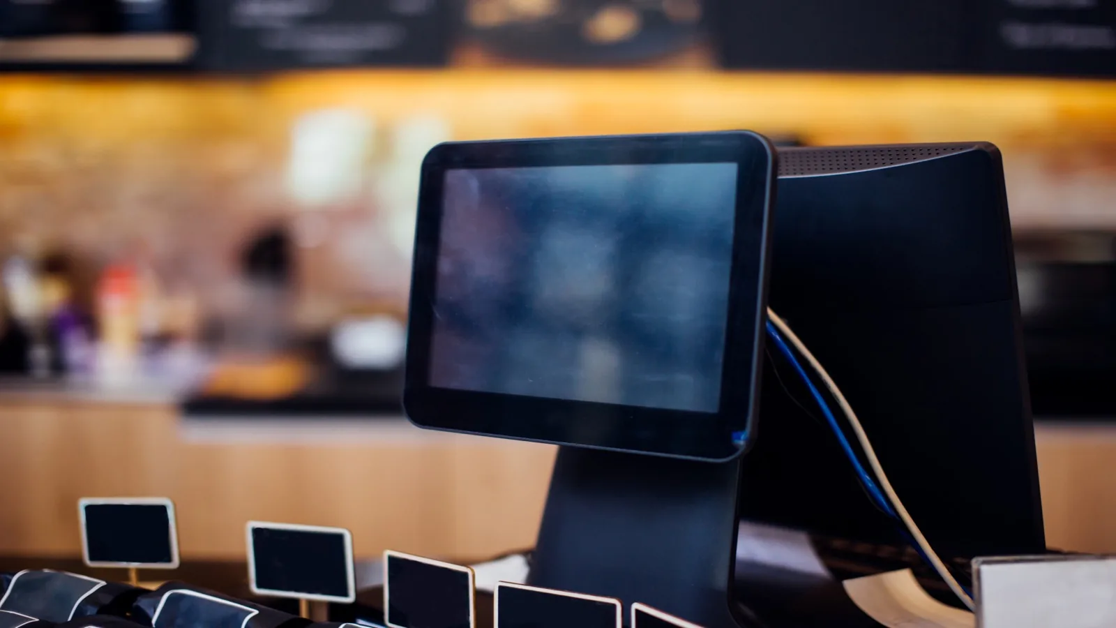 POS touchscreen at a US coffee shop counter taking digital orders