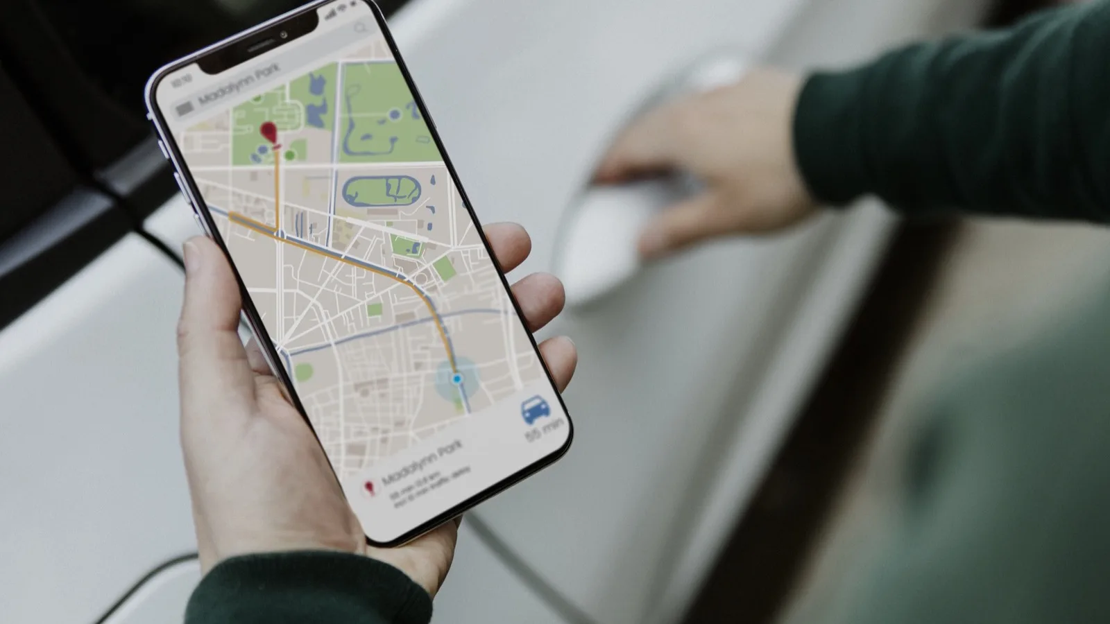 Smartphone showing Google Maps with business location pin