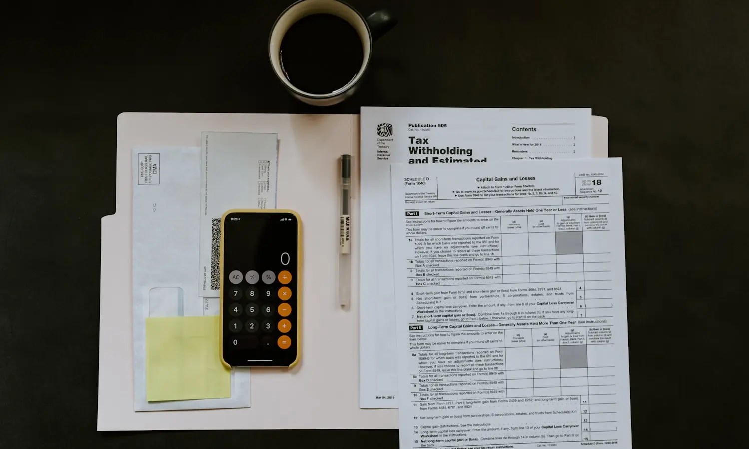 A tax form and a pen, which in this market means two jurisdictions