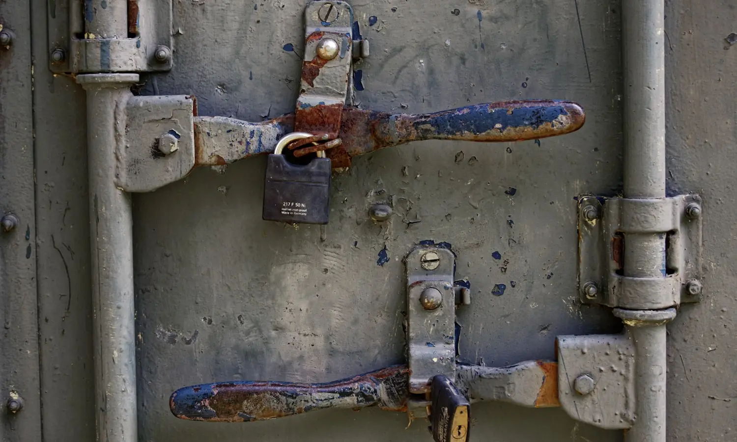 A sealed container door, the end of a paper trail somebody retypes