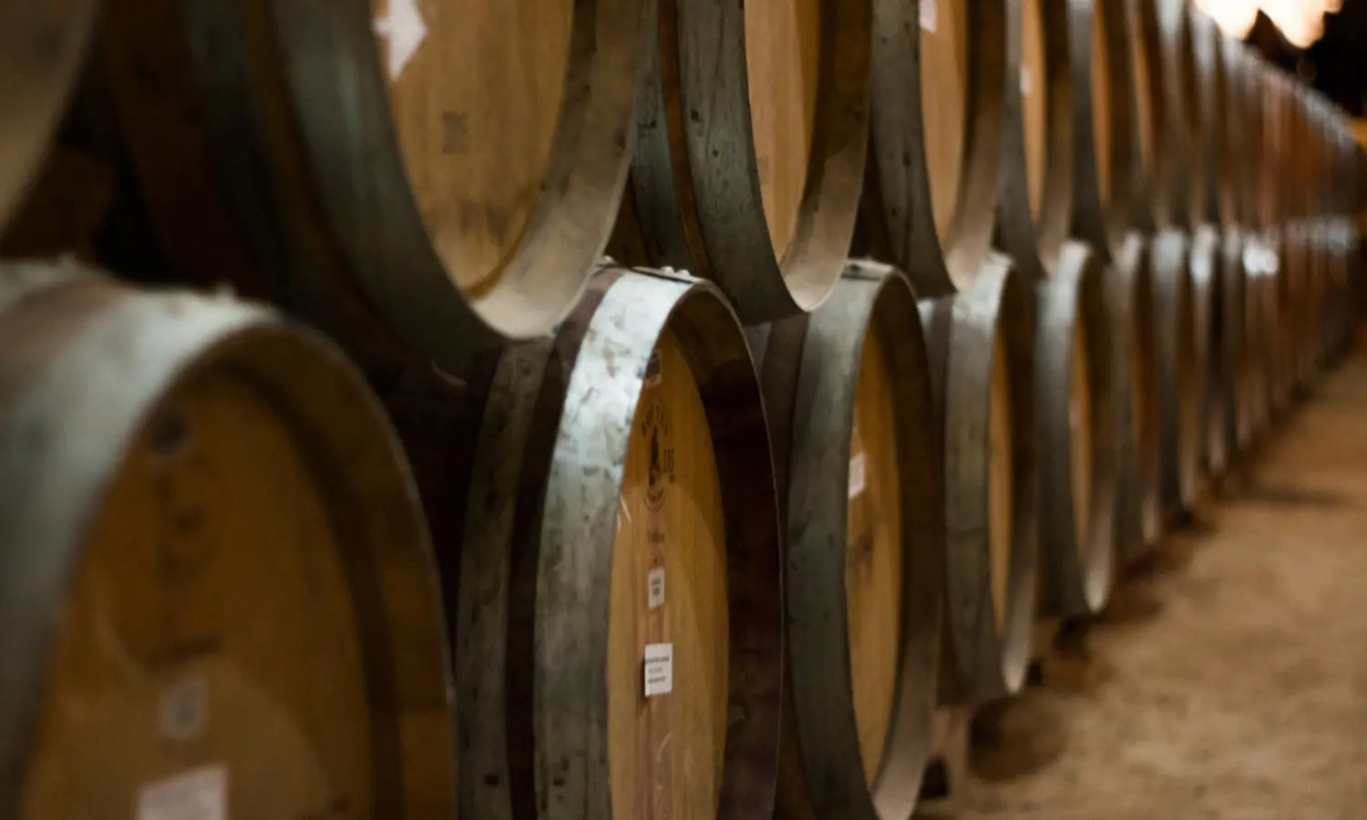 Barrels aging in a rickhouse, on a schedule the federal record follows
